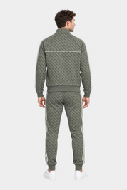 Tuta Follower SRL verde con logo iconico GUESS, felpa full zip e pantaloni coordinati con bande laterali bianche